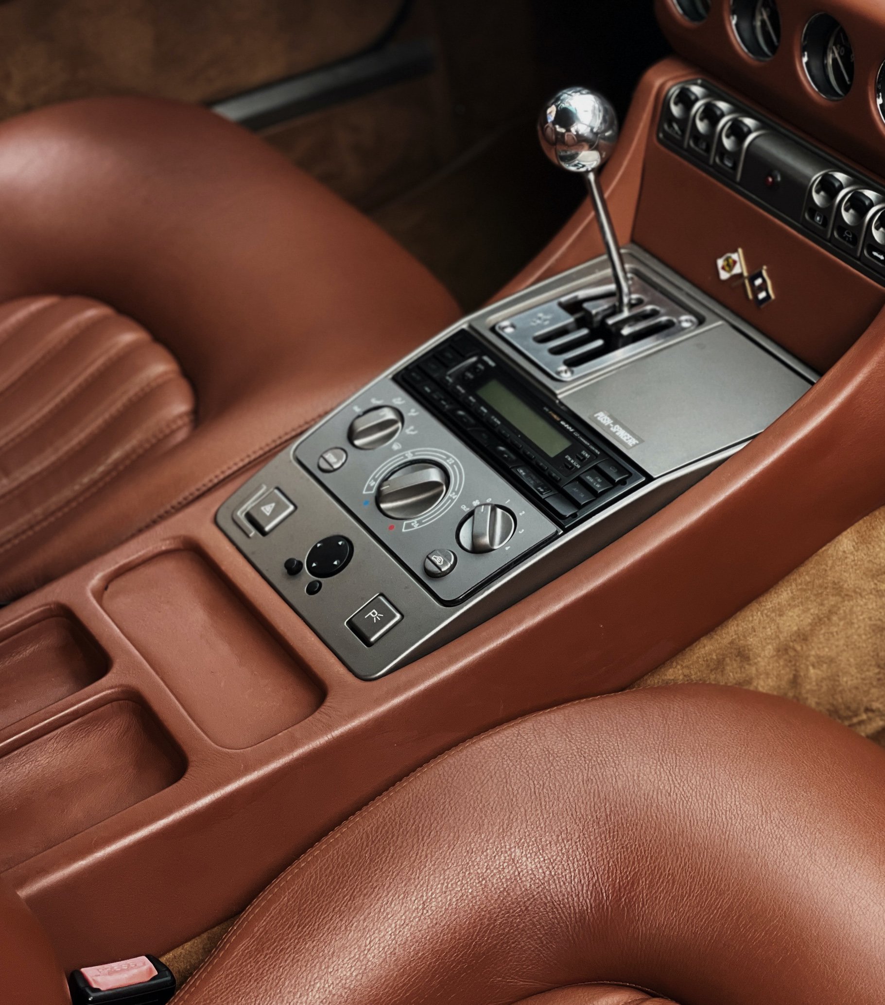 Car seat with grey upholstery, closeup view